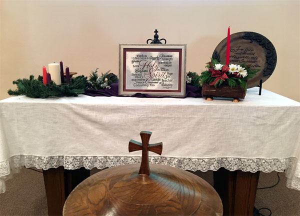 Holy Spirit stitched by Teresa Brown on an altar table
